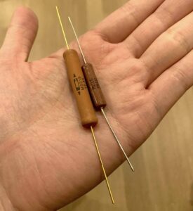 The Caddock precision power film resistor on the left, with a Mills non-inductive wirewound resistor of the same value on the right for comparison.