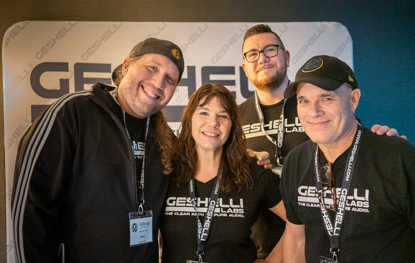 – Geshelli Labs is a family and friends affair. Here Geno, Sherri, Jake, and Joe Bisceglia light up their room. Their room had the coolest collection of colored lights at the show. If you’re bored with boring metal, beige, and black boxes, head over to Geshelli Labs and add a splash of color to your overly-sterile audio life.