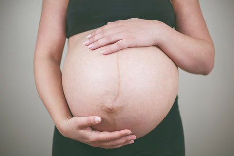 pregnant lady holding bump