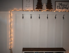 rope light christmas decorations on mantle