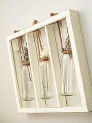 hanging rope decor with glass bottles