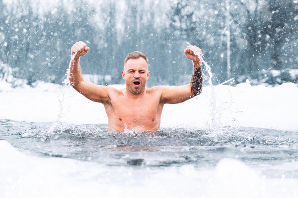 Image of man taking natural ice bath for workout recovery