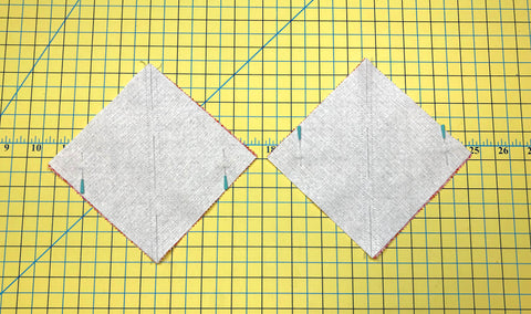 Half Square Triangles sew on both sides of the diagonal line