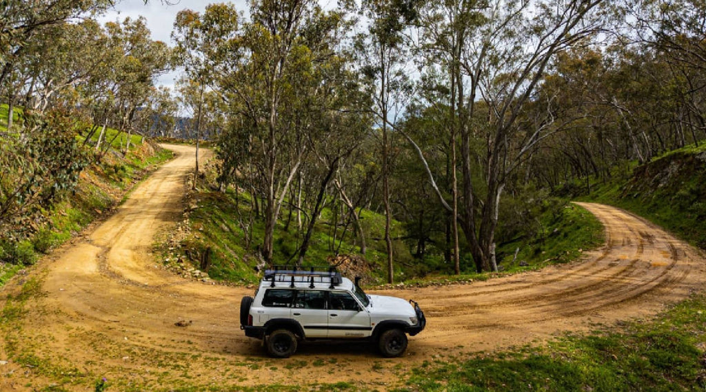 EXPLORE DOWN UNDER'S 4 WHEEL DRIVE ON A HAIRPIN DIRT ROAD