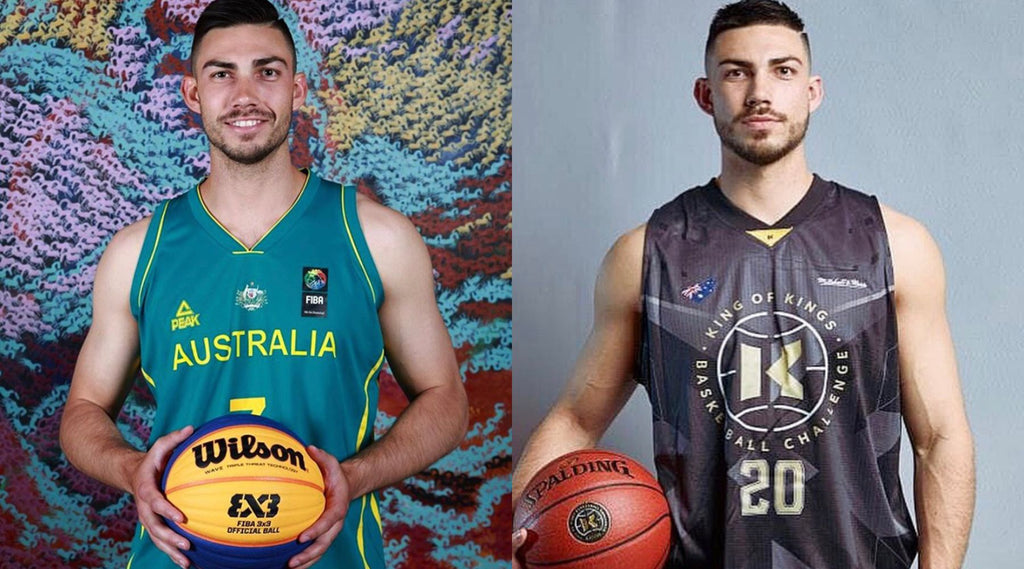 DARCY HARDING WEARING HIS KINGS AND AUSTRALIA BASKETBALL UNIFORM HOLDING A BASKETBALL.