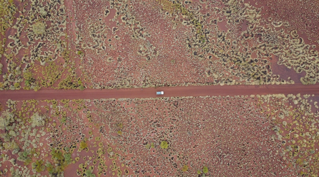 RED ROADS THROUGH SPINIFEX PILBARA