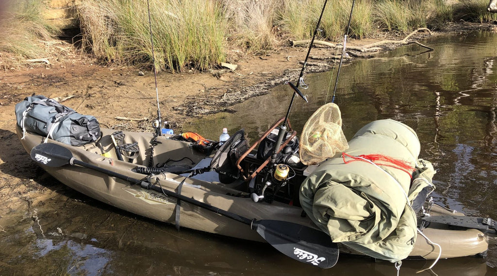 FISHING FROM A KAYAK WITH A NORTH STORM 60L WATERPROOF DUFFEL BAG 