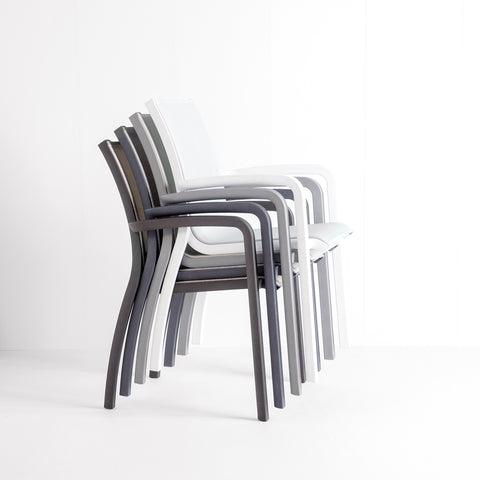 Stacking resin chairs increase the functionality of outdoor commercial settings