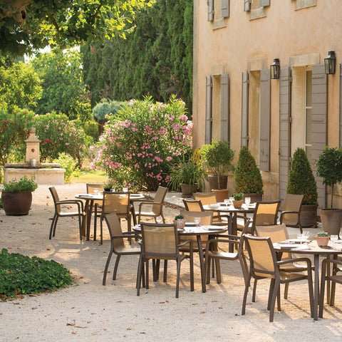 Sunset Armchairs in outdoor dining setting