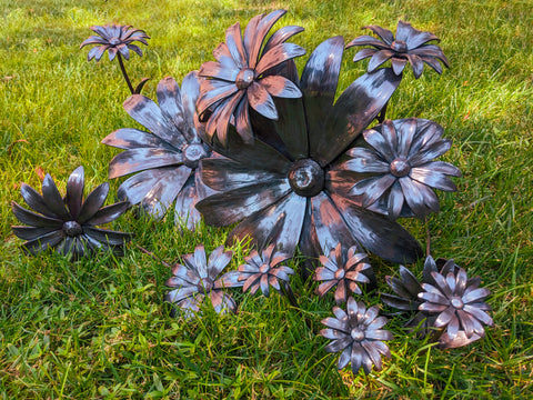 Hand forged iron flowers now available for sale at Raiford Gallery