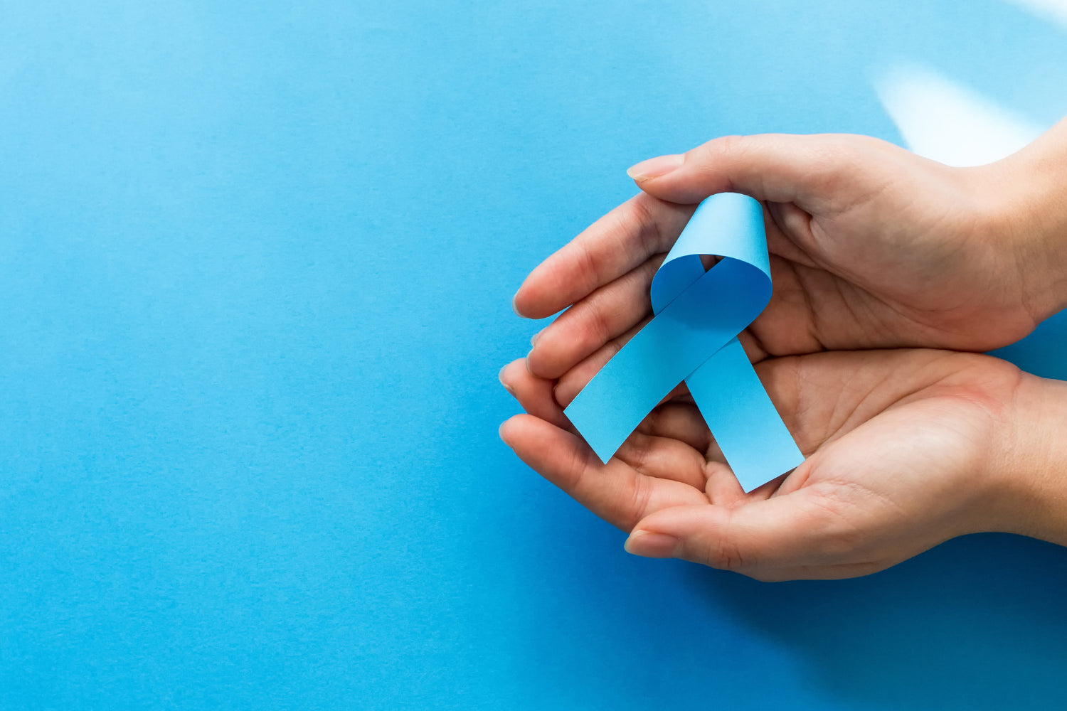 Blue Ribbon, signifying Prostate Cancer awareness.