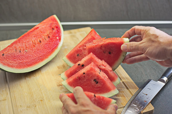 Watermelon's rich nutritional profile includes essential vitamins, antioxidants, and a low purine count, promoting overall health.