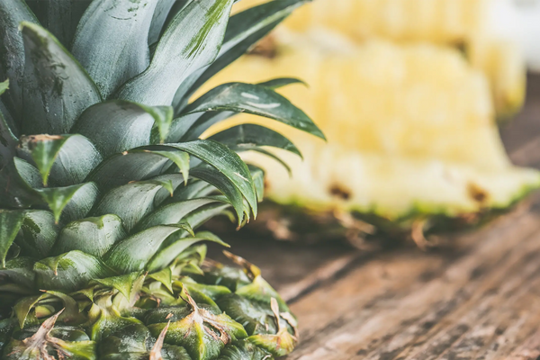 Pineapple is beneficial for gout due to its low purine content, reducing the risk of elevated uric acid levels.