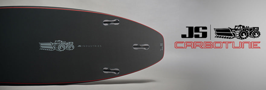 JS Carbotune Carbon Fibre surfboard in a studio