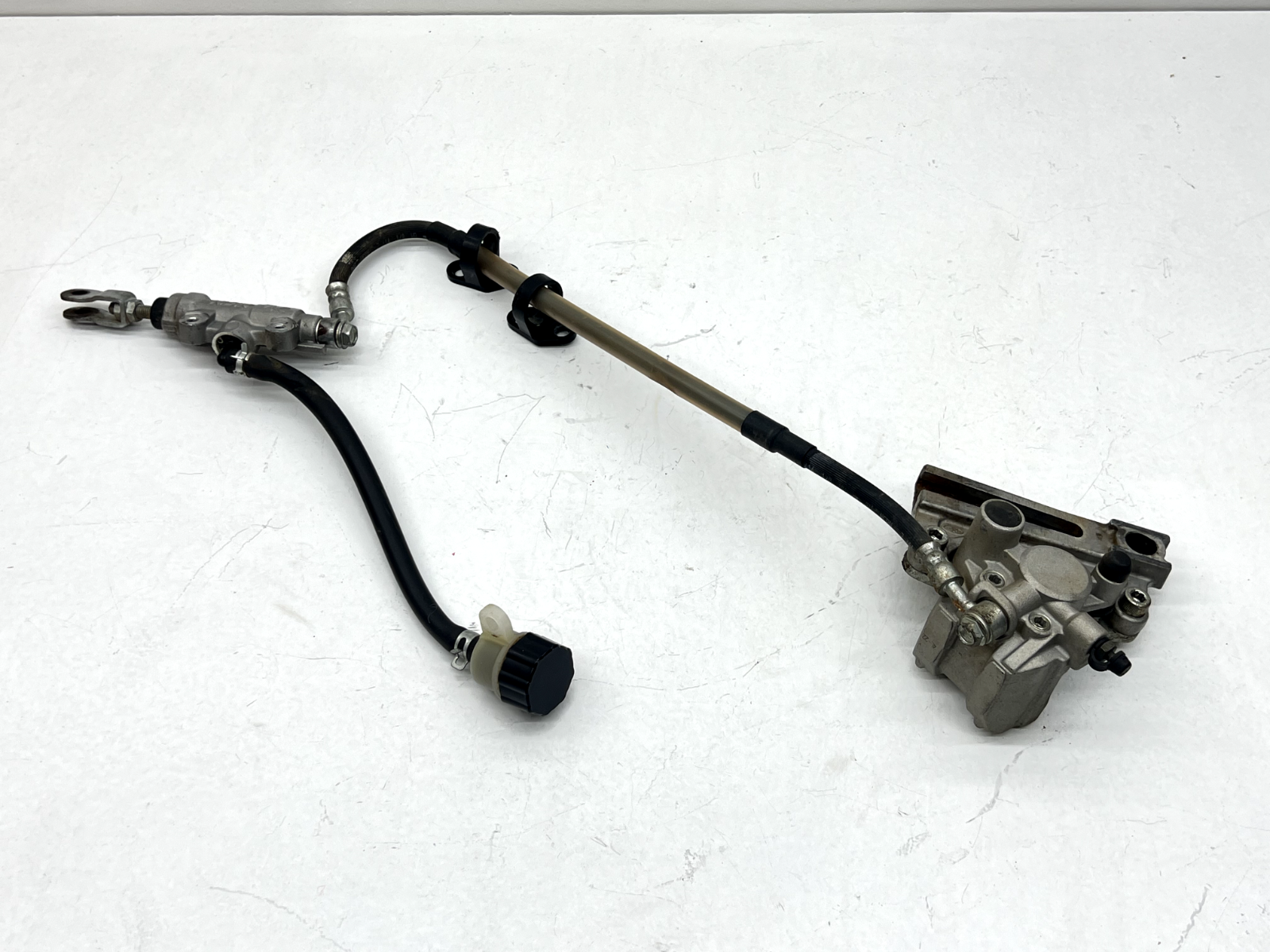 2015 Kawasaki KX85 Rear Brake OEM Assembly Caliper Master Cylinder Line Bracket