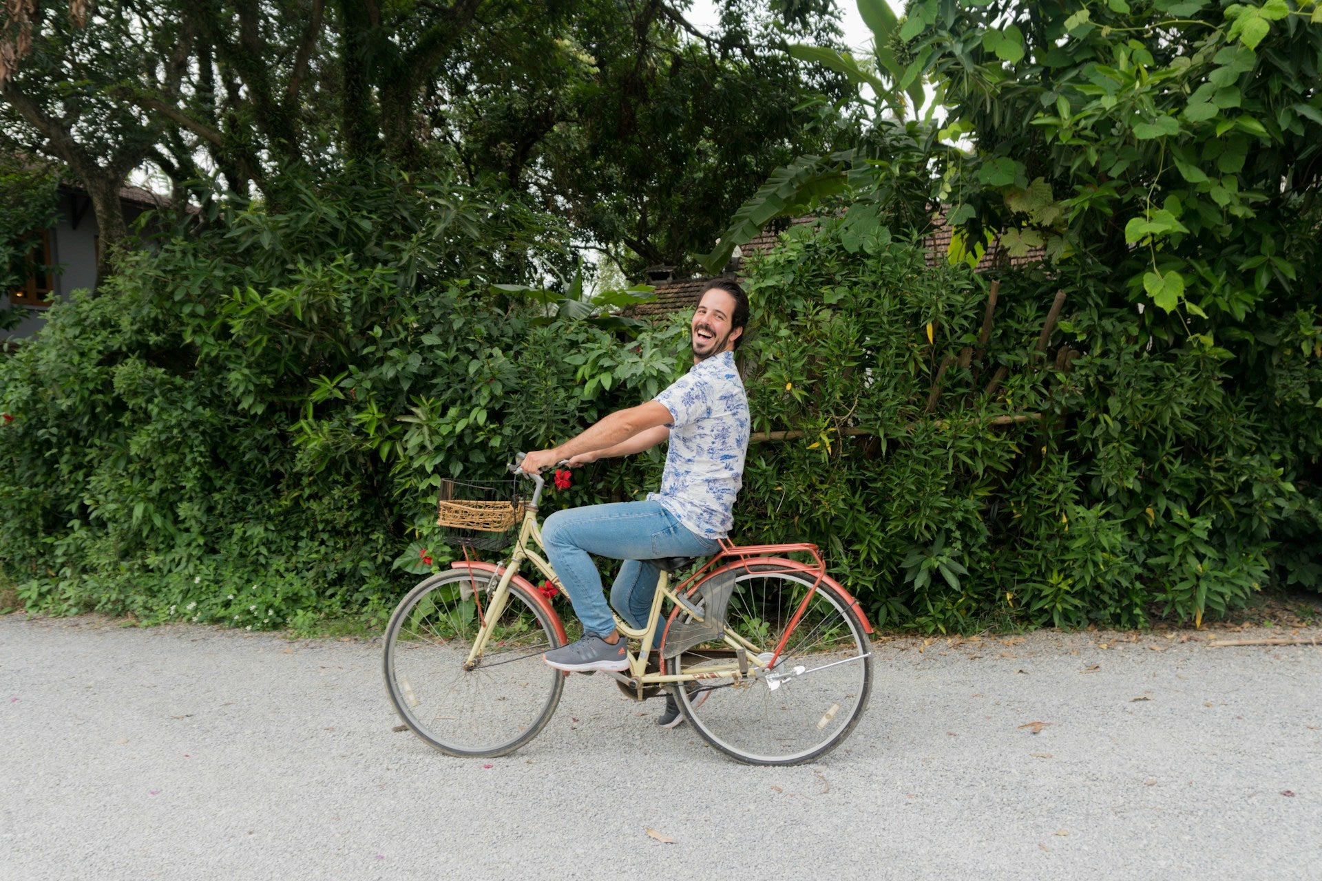 man riding a bike happily summer activity ideas