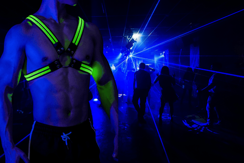man-wearing-neon-harness-music-festival