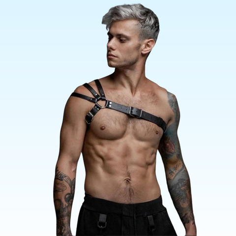 man wearing thin strap leather gay harness