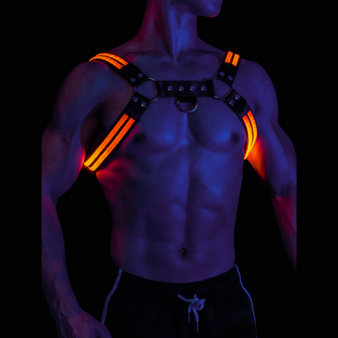 man wearing glow in the dark led gay harness