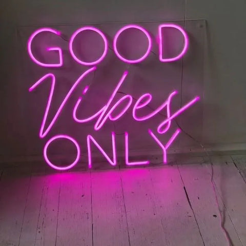 the image is showing a good vibes only neon signs to  spread positivity 