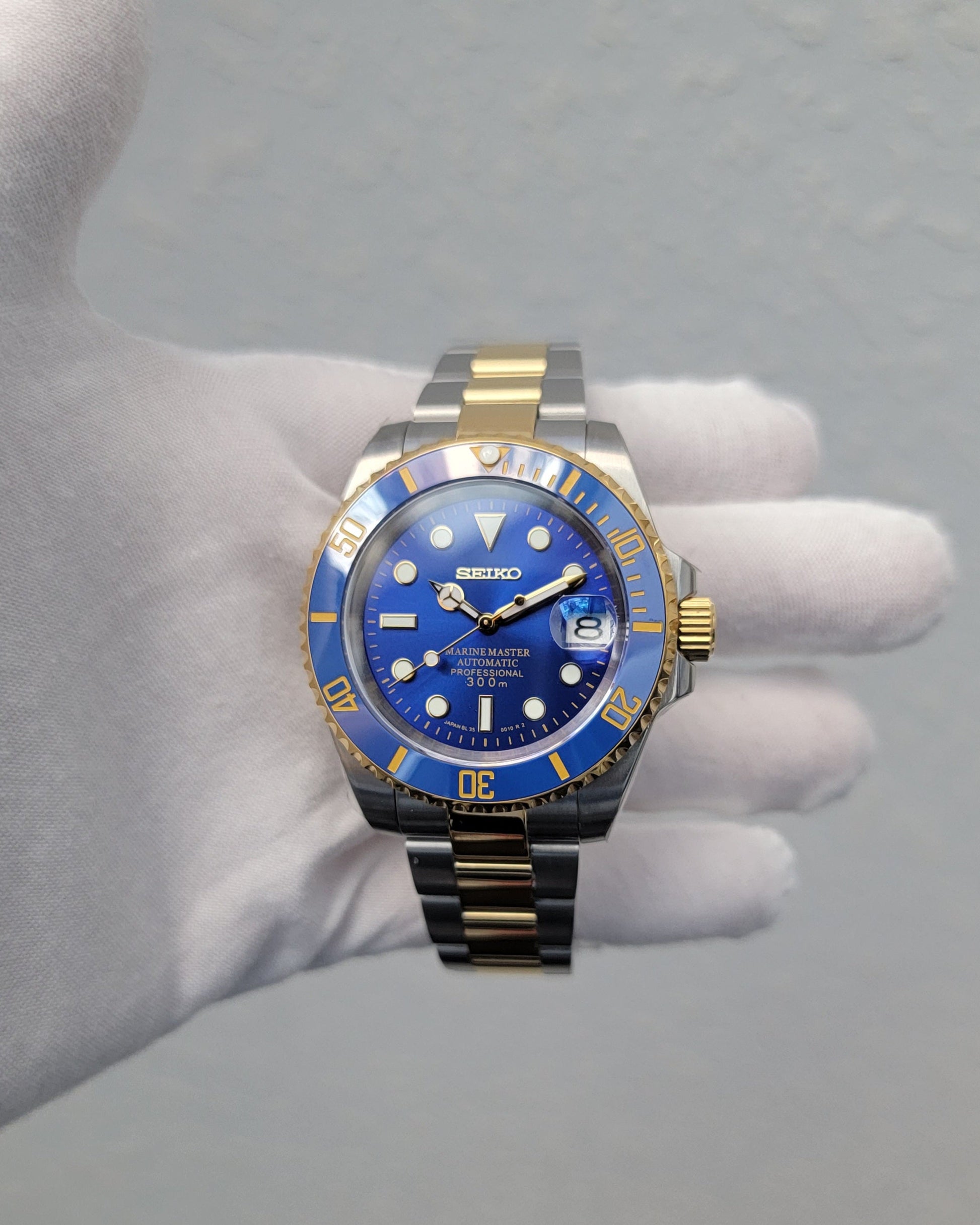 Seiko Sub Ceramic Date Mod - Bluesy Two Tone Yellow Gold - Seiko NH35 –  Alpine Mods