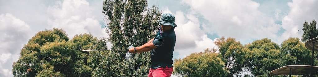 Golfing with Sun Bucket Hat