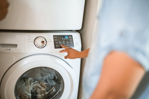 Man using a washing machine