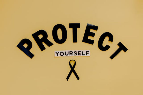 Protect yourself with black skin cancer ribbon