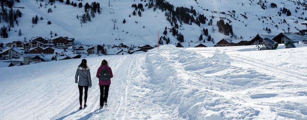 Walking in the snow with sun protection