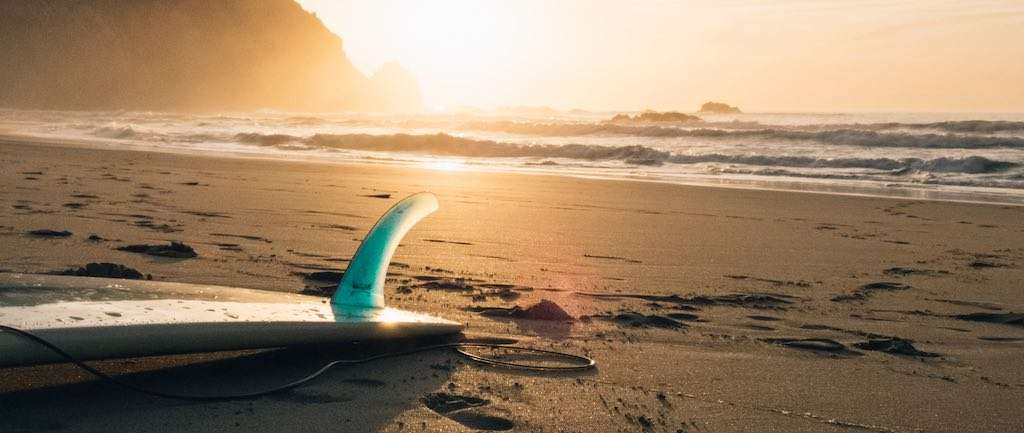 Surfboard in the Sand on Sunny Beach