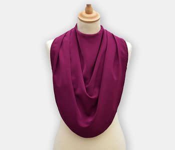 Protective pashmina bib to protect clothing while eating, in a burgundy color.
