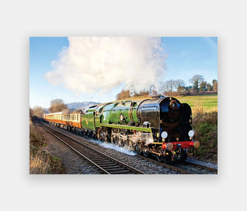 Simplified 13-piece Relish puzzle of a steam train passing through the countryside, leaving a white cloud in its path.