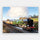 Simplified 13-piece Relish puzzle of a steam train passing through the countryside, leaving a white cloud in its path.