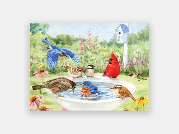 Simplified 35-piece Relish puzzle of bathing birds, including a cardinal, in a flowering garden.