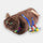 The brown cat Twiddle sensory sleeve for people living with dementia with fidgety hands with detachable ribbons.