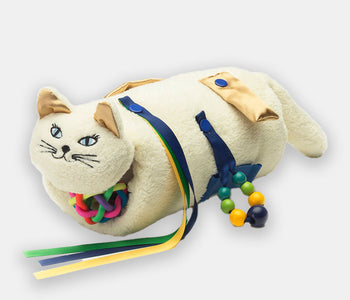The white cat Twiddle sensory sleeve for people living with dementia with fidgety hands with detachable elements.