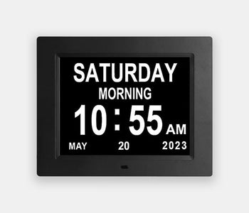 12 alarm Calendar Clock with a black frame made to help with the autonomy of people living with dementia.