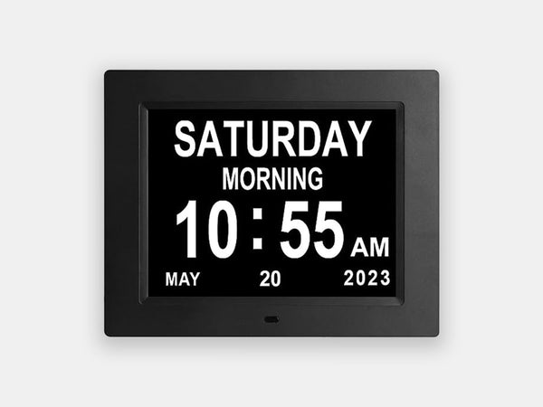 12 alarm Calendar Clock with a black frame made to help with the autonomy of people living with dementia.