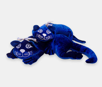 Two Manimo dark blue plush cats: comforting with their weight for people living with dementia.