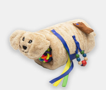 The cream puppy Twiddle sensory sleeve for people living with dementia with fidgety hands.