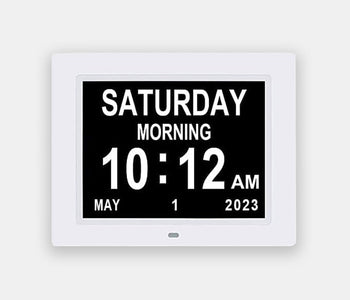 12 alarm Calendar Clock with a white frame made to help with the autonomy of people living with dementia.