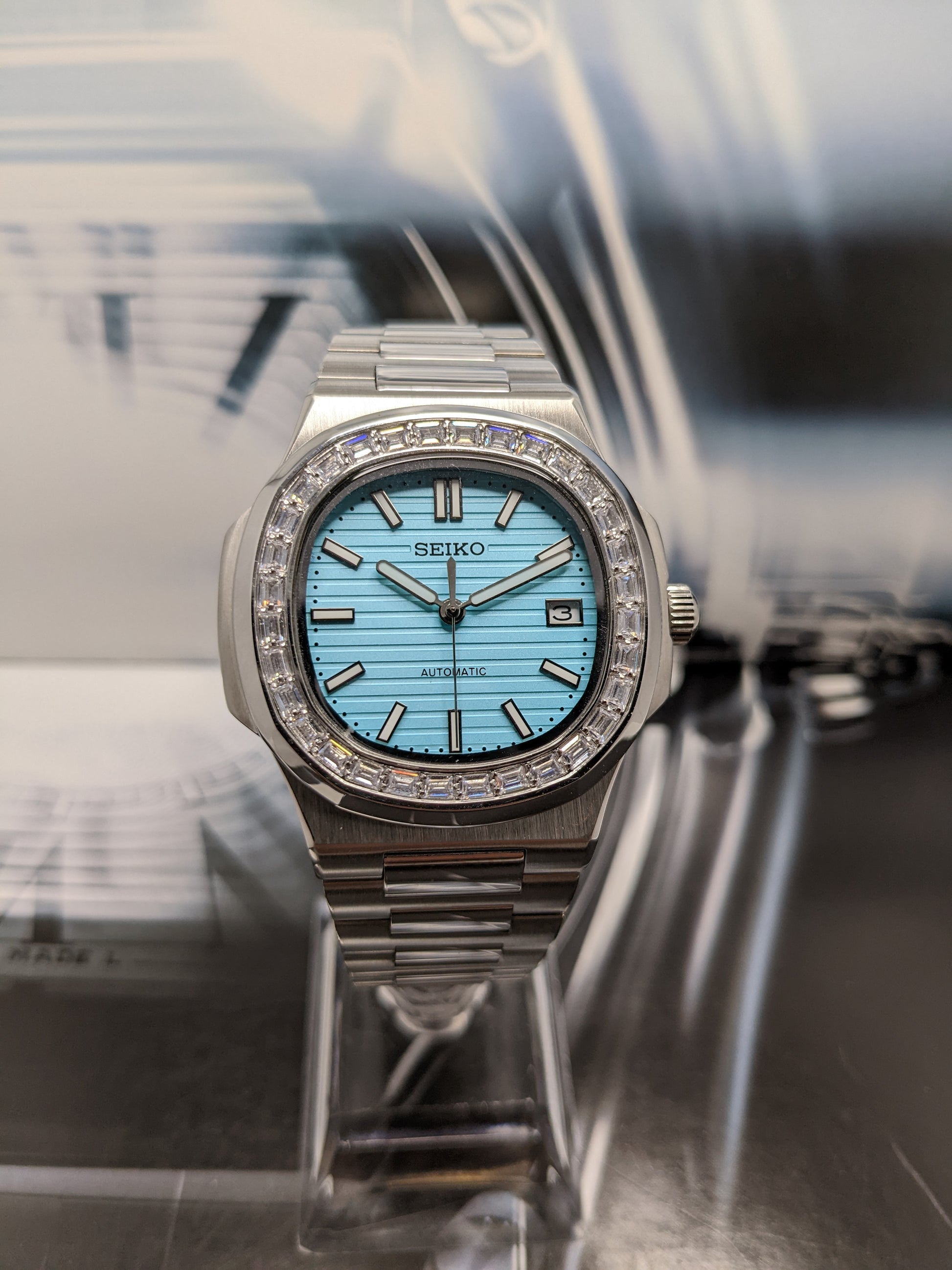 Seiko Mod Nautilus Ice Blue dial white stone case Custom Build –  Watchmodders