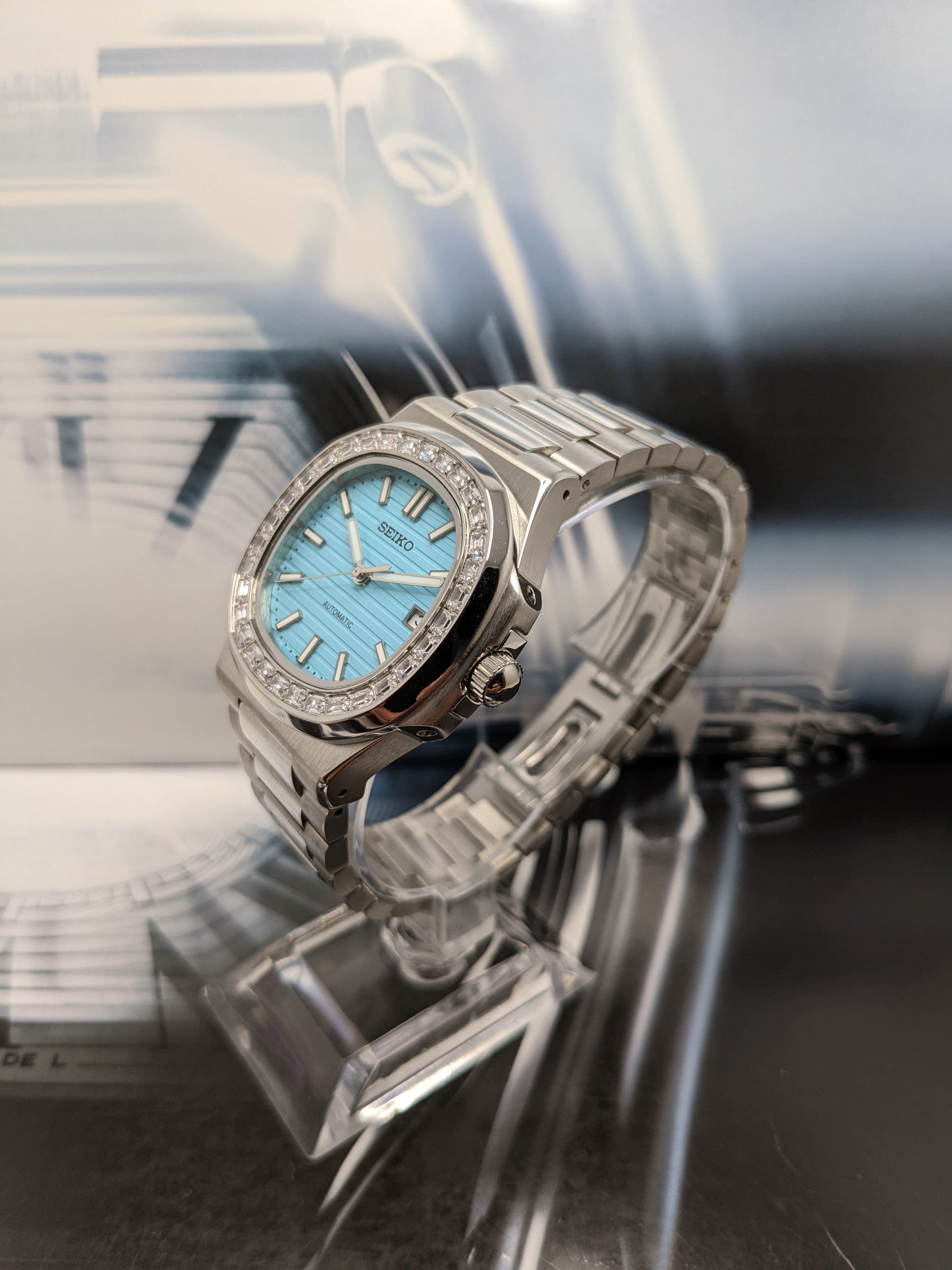 Seiko Mod Nautilus Ice Blue dial white stone case Custom Build –  Watchmodders