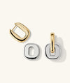 Stevie Hoops earrings featuring gold and silver interchangeable, reversible links, allowing for customizable designs.
