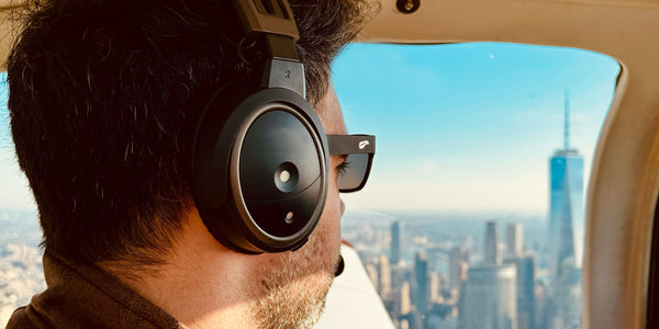 A private pilot overlooking the New York skyline while flying in his Grumman