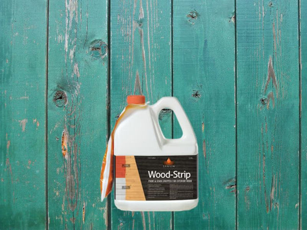 The bottle of the Sansin Wood Stripe product is in front of a floor made of wooden planks stained with a pale green, almost turquoise color. The wood is visible in some areas because the stain is old and needs to be stripped off with the Sansin Wood Stripe.