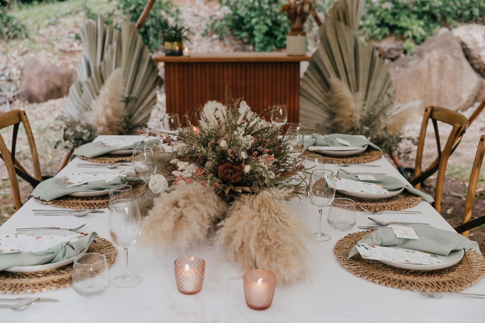 papyrus wedding with dried flowers table setting. sage linen place cards and illustrated menus