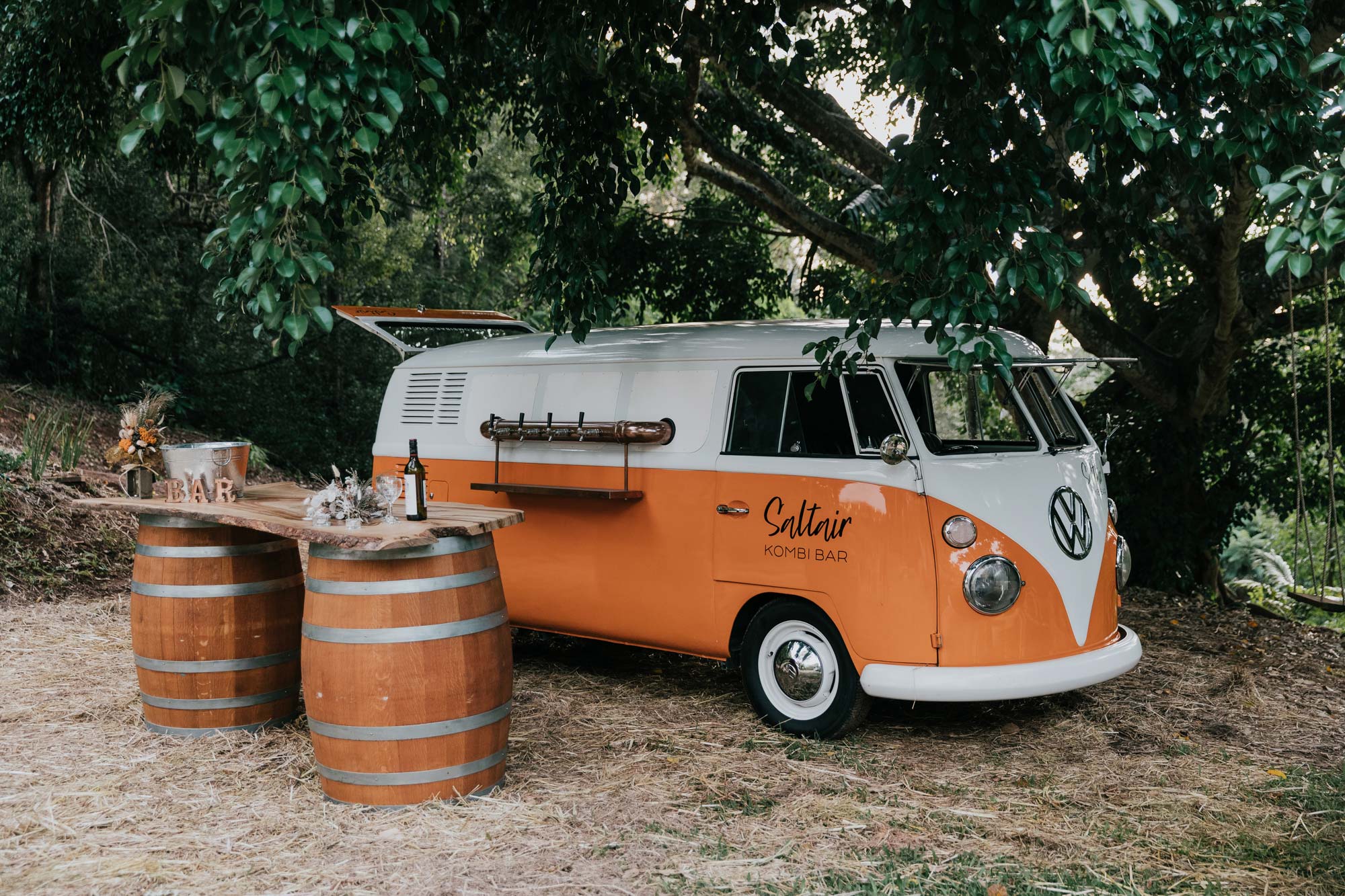 Saltair kombi bar with beer taps. orange kombi converted van