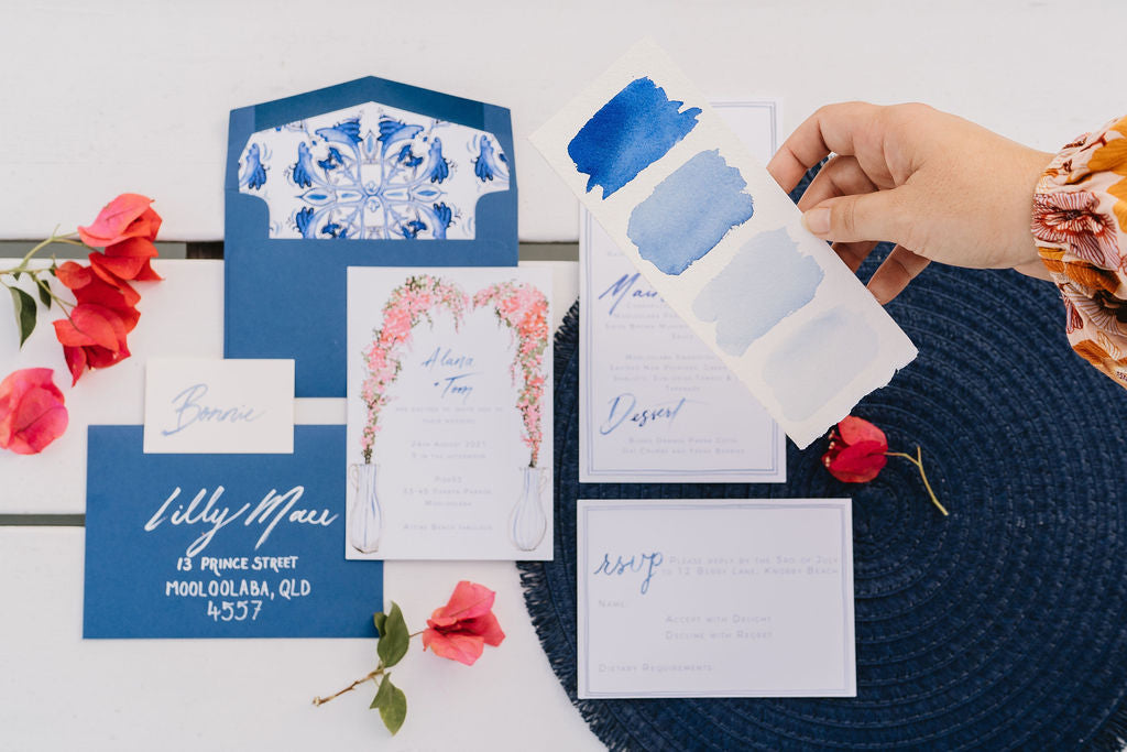 pink and blue and white wedding style stationery