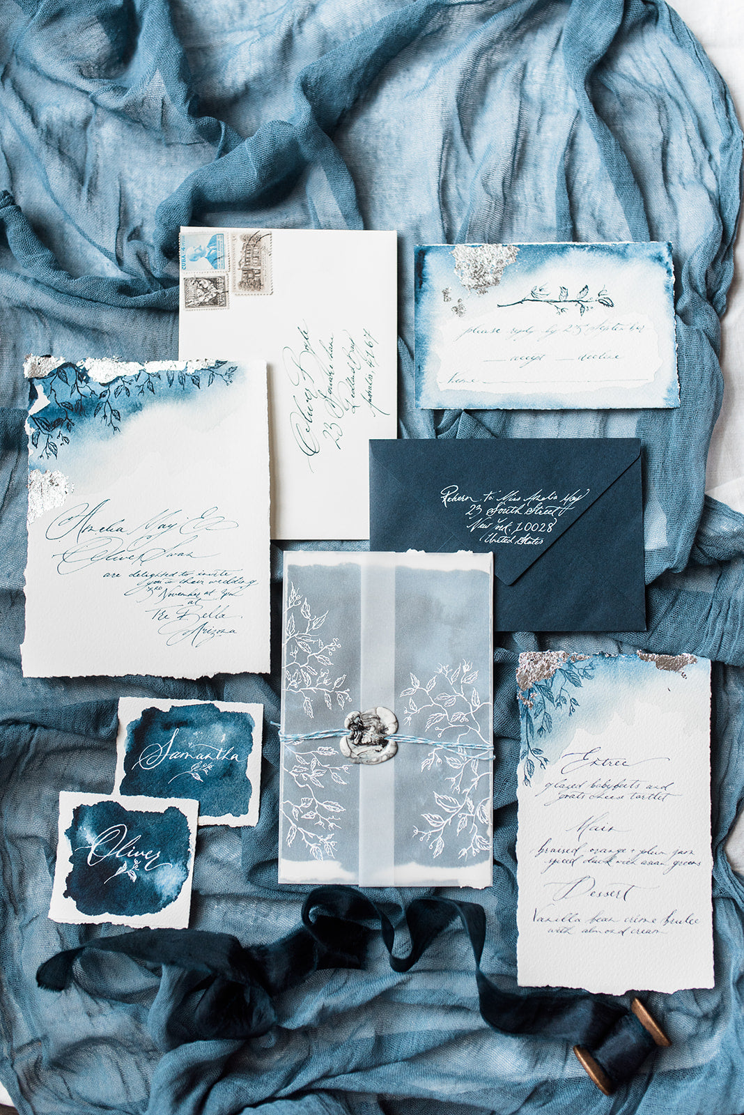 silver foil and navy wedding invitation suite with casual calligraphy and watercolour touches.